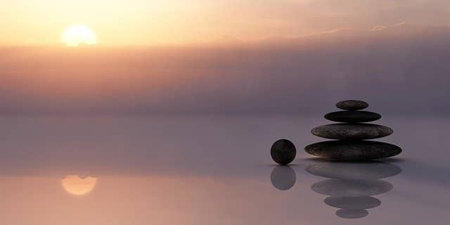 quiet lake with rocks for meditation